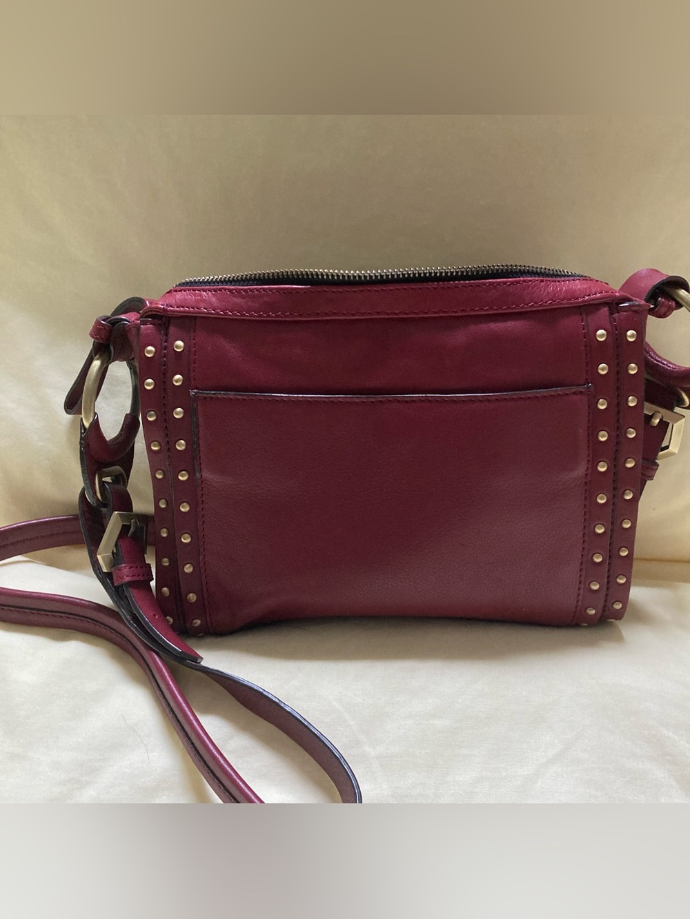 orYANY maroon(burgundy) leather, studded brass hardware  crossbody